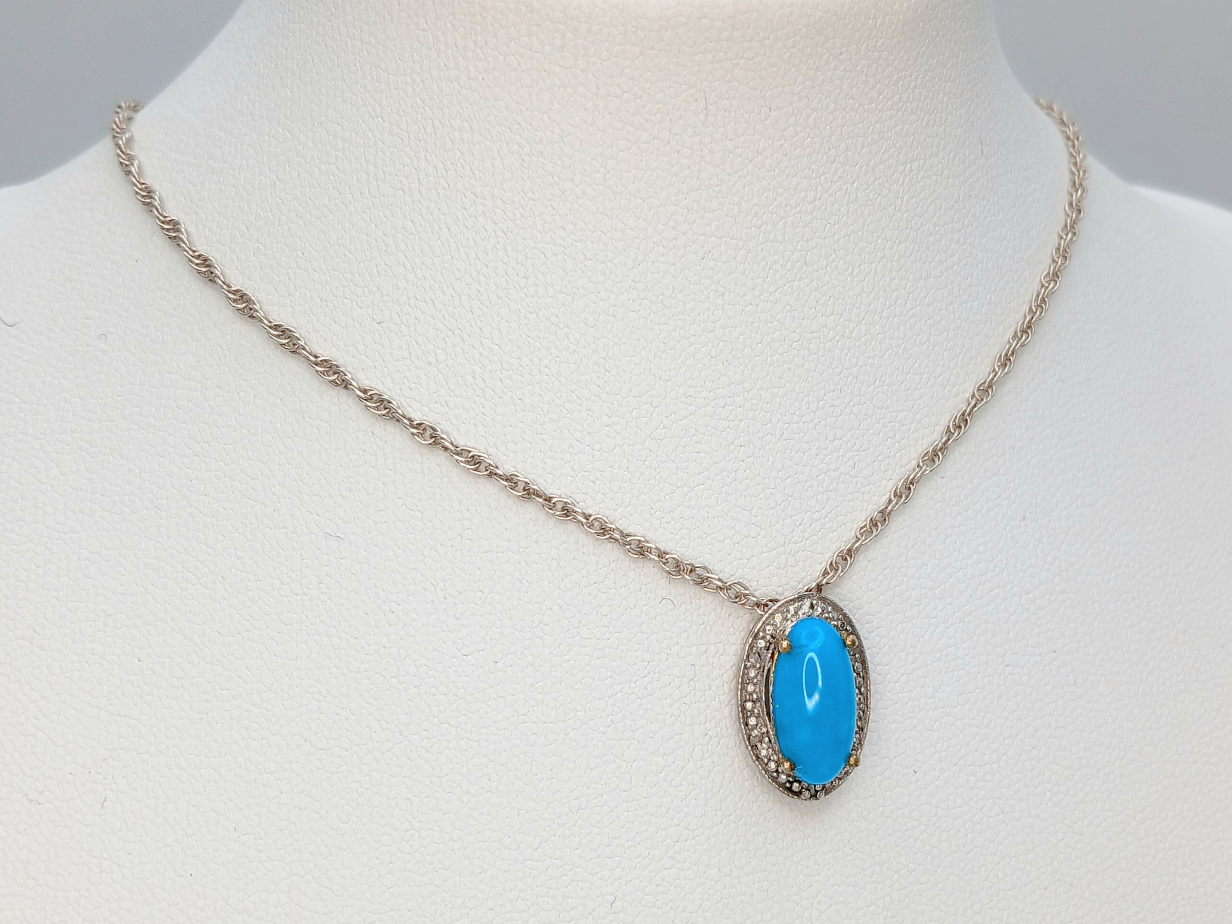 A 825 gilded silver Turquoise and stone set pendant, set on a silver necklace