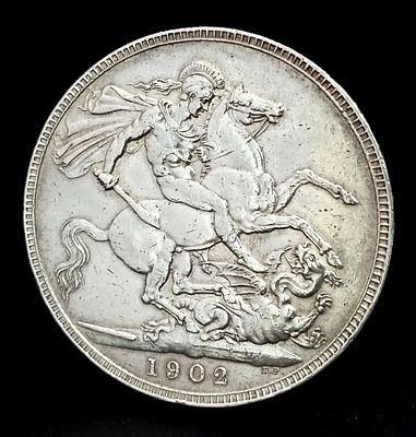 A 1902 Edward VII Silver Crown Coin. VF+ grade with excellent definition but please see photos. 