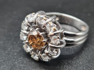 An 18K White Gold Pre-1940 Edwardian Diamond Cluster Ring. 0.5ct Centre-Set with a 1.25ct GIA 