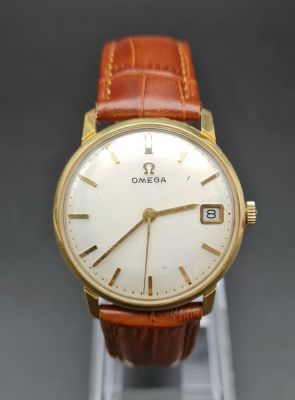 A Vintage 1960s 18K Gold Omega Gents Dress Watch. Mechanical - Wind Up Movement. Leather strap. 