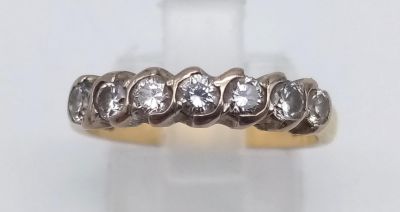 An 18 k yellow gold ring with seven diamonds (0.45 carats). ring size: M, weight: 3.3 g.