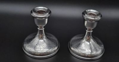 A pair or antique candlesticks, nicely engraved on base, Birmingham hallmark, 12cm in height 