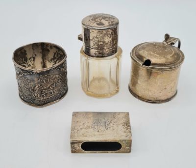 Four Antique Silver Items: A Matchbox holder, Small hinged pot - 4cm, napkin holder and a small 