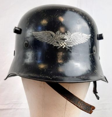 3rd Reich M18 Pattern Luftshutz Helmet. Surplus WW1 helmets were used during the early days of 