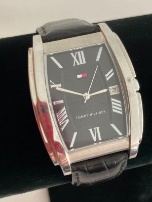 Gentlemans Quartz TOMMY HILFIGER wristwatch, Square black face model finished in silver tone 