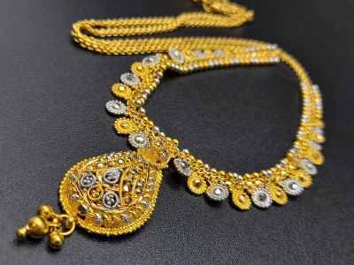 A Glamourous 22k Yellow and White Gold Asian Design Necklace with Hanging Shell Pendant. 3 and 