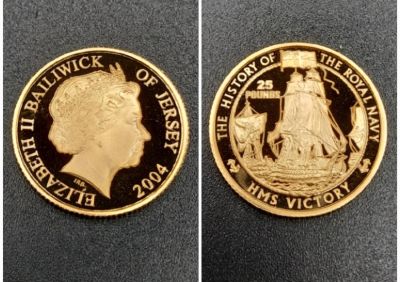 A 22K Gold Proof Coin Celebrating HMS Victory. Westminster limited edition Jersey mint. Comes 