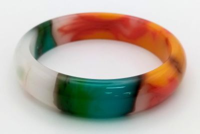 A Wonderful Multi-Coloured Jade Bangle. Inner diameter 6.5cm.