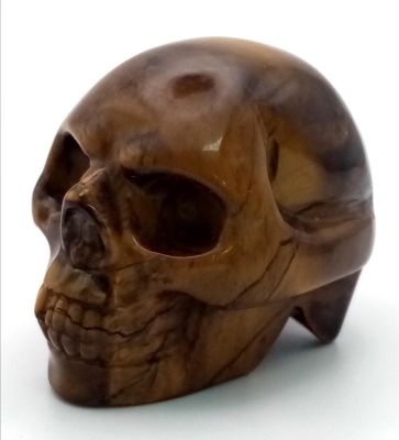 A Hand-Carved Tigers Eye Crystal Skull Figure. Perfect as an ornament or small paperweight. 5 x 4cm