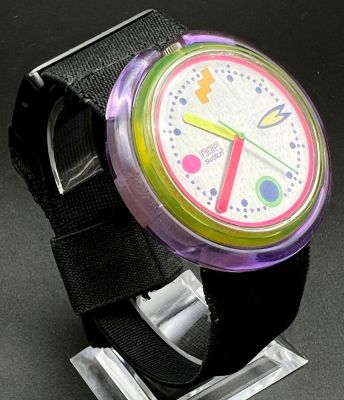 A Rare Limited Edition Vintage Pop Swatch Watch. Cloth strap. Case - 55mm. In working order.