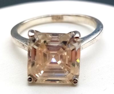 A 3.85ct Princess Cut White Moissanite Ring. Set in 925 Silver. Size N 1/2. Comes in a 
