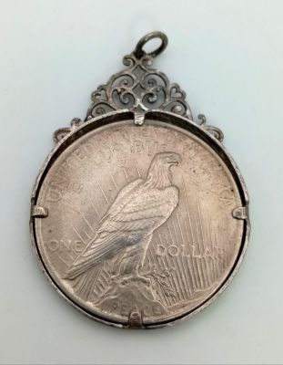 An Excellent Condition 1922 American Silver Dollar Silver Mounted to a Pendant. 32.34 Grams