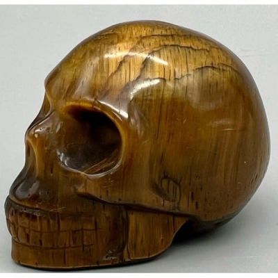 A Hand-Carved Tigers Eye Skull Figure. Ornament or paperweight. 6cm