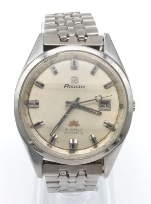 A Vintage Ricoh Automatic 21 Jewel Gents Watch. Stainless steel strap and case - 38mm. Cream 