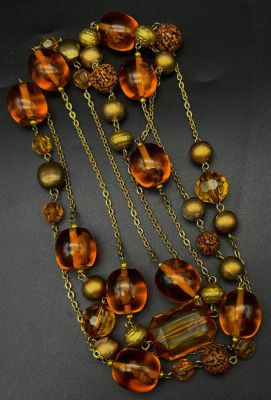 Am Amber-Coloured Resin Rope-Length Insect Necklace. 150cm.