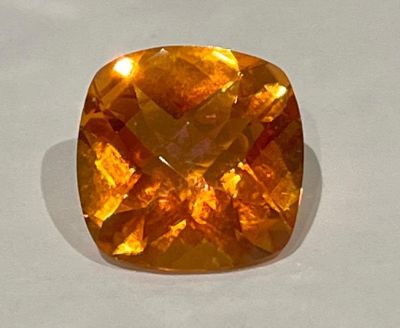A 14ct Cognac Coloured Gemstone (possibly tourmaline). Square cut and well faceted. No 