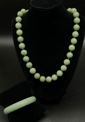 A Pale Green Jade Bangle and Necklace Bead Set. Beads -14mm. 6cm inner diameter bangle. 