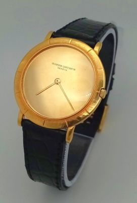 AN ELEGANT VACHERON AND CONSTANTIN 18K GOLD GENTS WATCH IN ROUND SLIMLINE SHAPE WITH MANUAL 