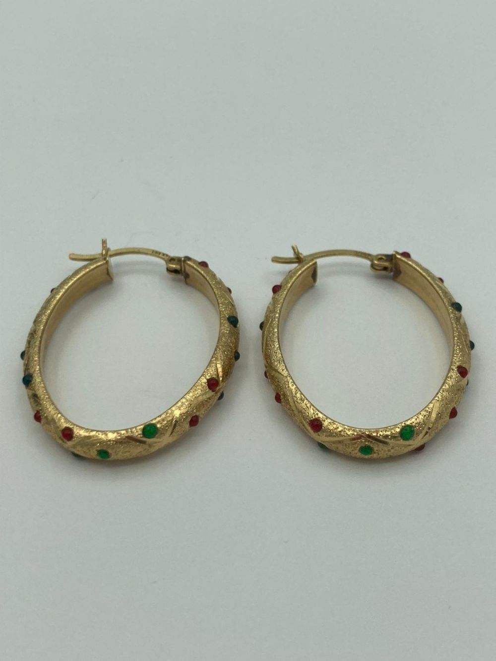 Stunning pair of 14 carat GOLD GEM SET EARRINGS, Oval Hoop Shape having stones in shades of 