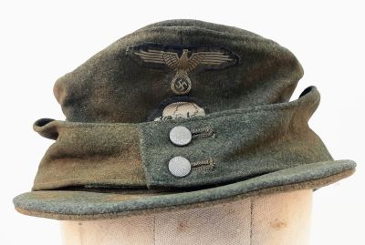 3rd Reich Waffen SS M43 Ski Cap. Period related small tear on the top. Overall good condition 