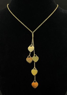 A Tiffany and Co 18K Yellow Gold Five-Heart Necklace. 40cm - necklace. 8cm - hearts attachment. 