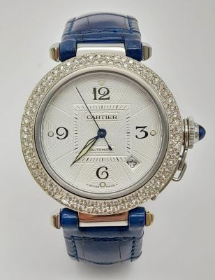 A stainless steel PASHA DE CARTIER watch. Case 38 mm, Bezel with two rows of diamonds 