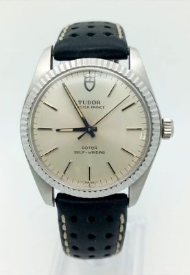 A Vintage Tudor Oyster Prince Gents Watch. Black leather strap. Steel case -35mm with gold 