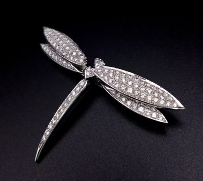 A Wonderfully Crafted 18K White Gold Dragonfly Brooch. Approximately 3.5ct of diamonds. 5.5cm 
