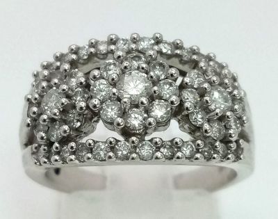 A 14K White Gold Diamond Three Flower Cluster Ring. 0.8ct approx. Size N. 6.61g