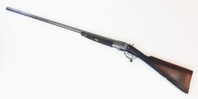 A 8 bore shotgun by renown Liverpool gunmaker L&amp;G Higham, 36" single damascus barrel, under 