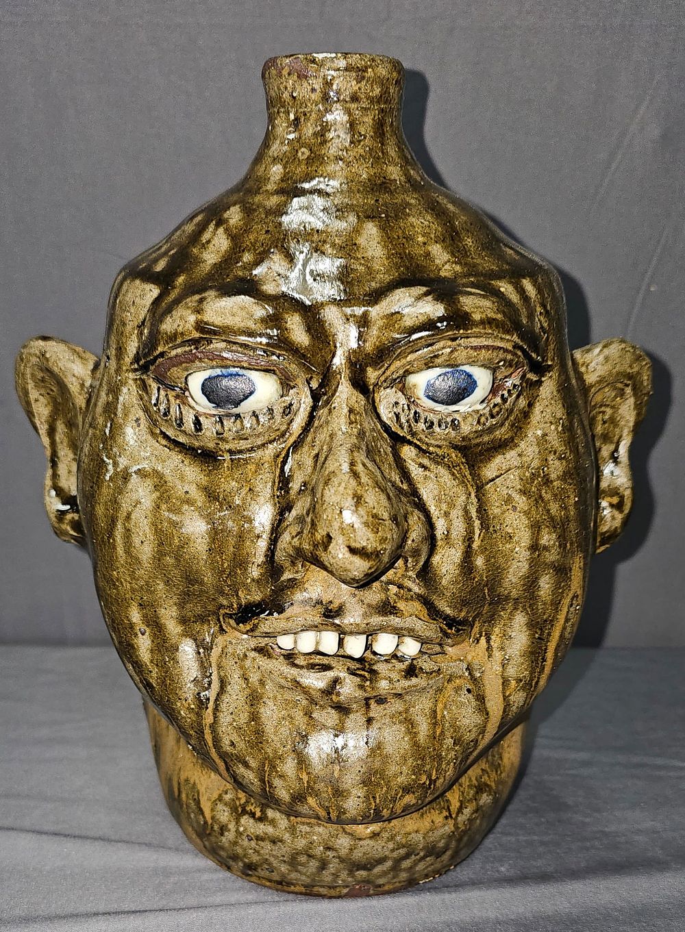 Lot 141: Stunning Lanier Meaders Face Jug