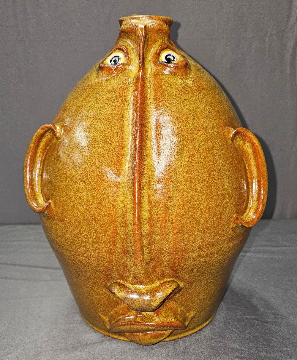 Lot 163: Roger Corn 2gal Long Nose Face Jug 1999
