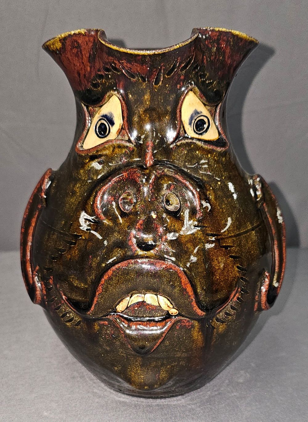 Lot 166: Fine 2001 Roger Corn Snaggle Tooth Face Pitcher
