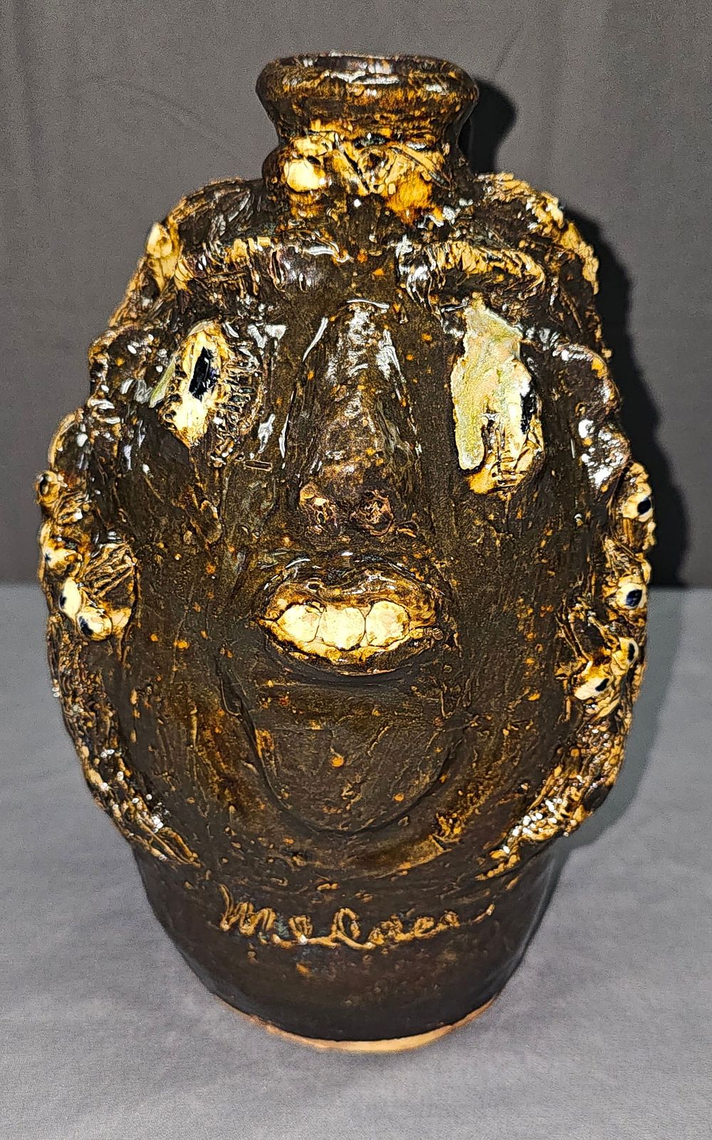 Lot 167: Significant Marie Rogers Medusa Face Jug