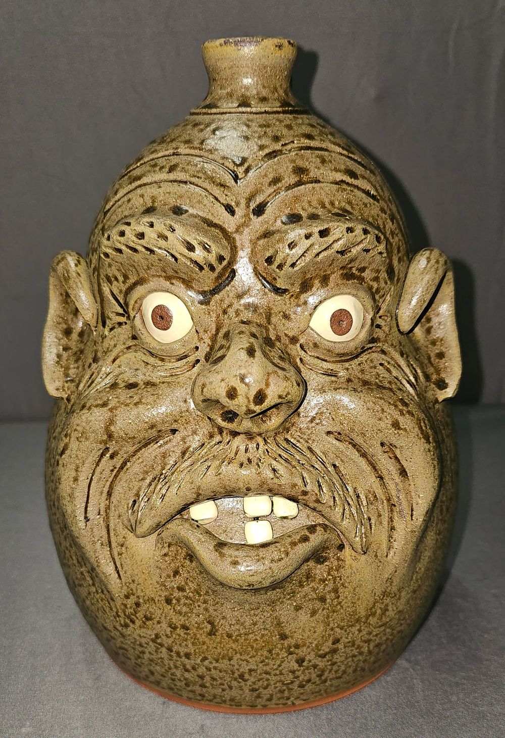 Lot 210: 2001 Michael Perdue One Gallon Face Jug