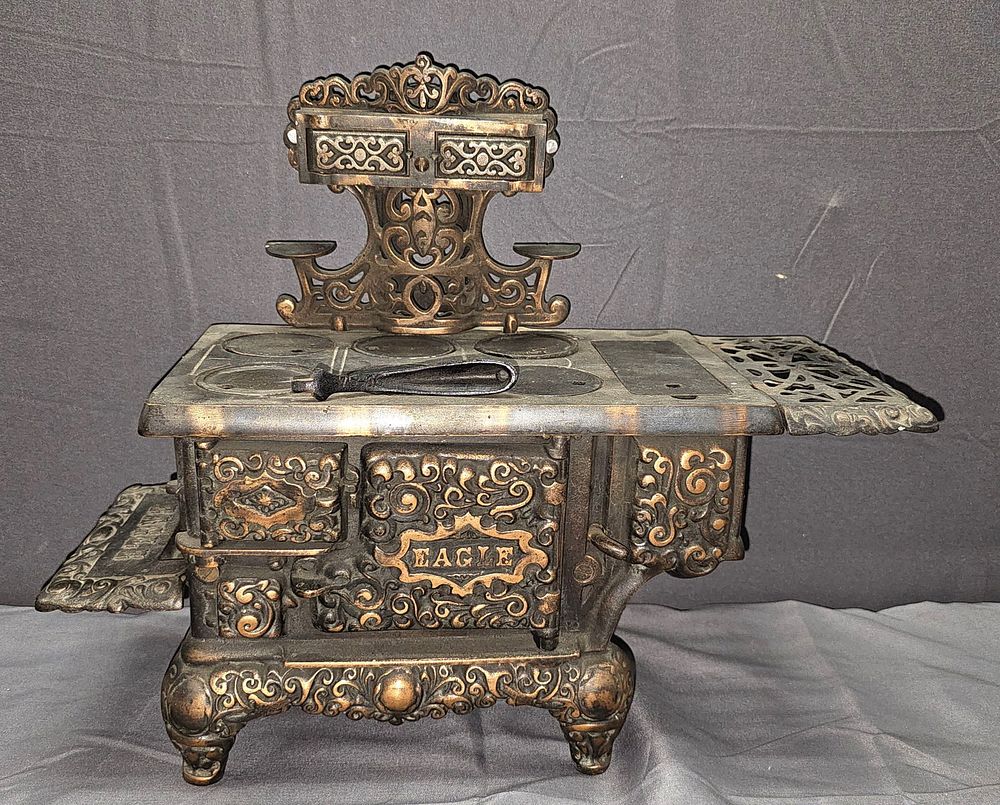 Lot 184: Cast IronEagle Cook Stove Salesman Sample