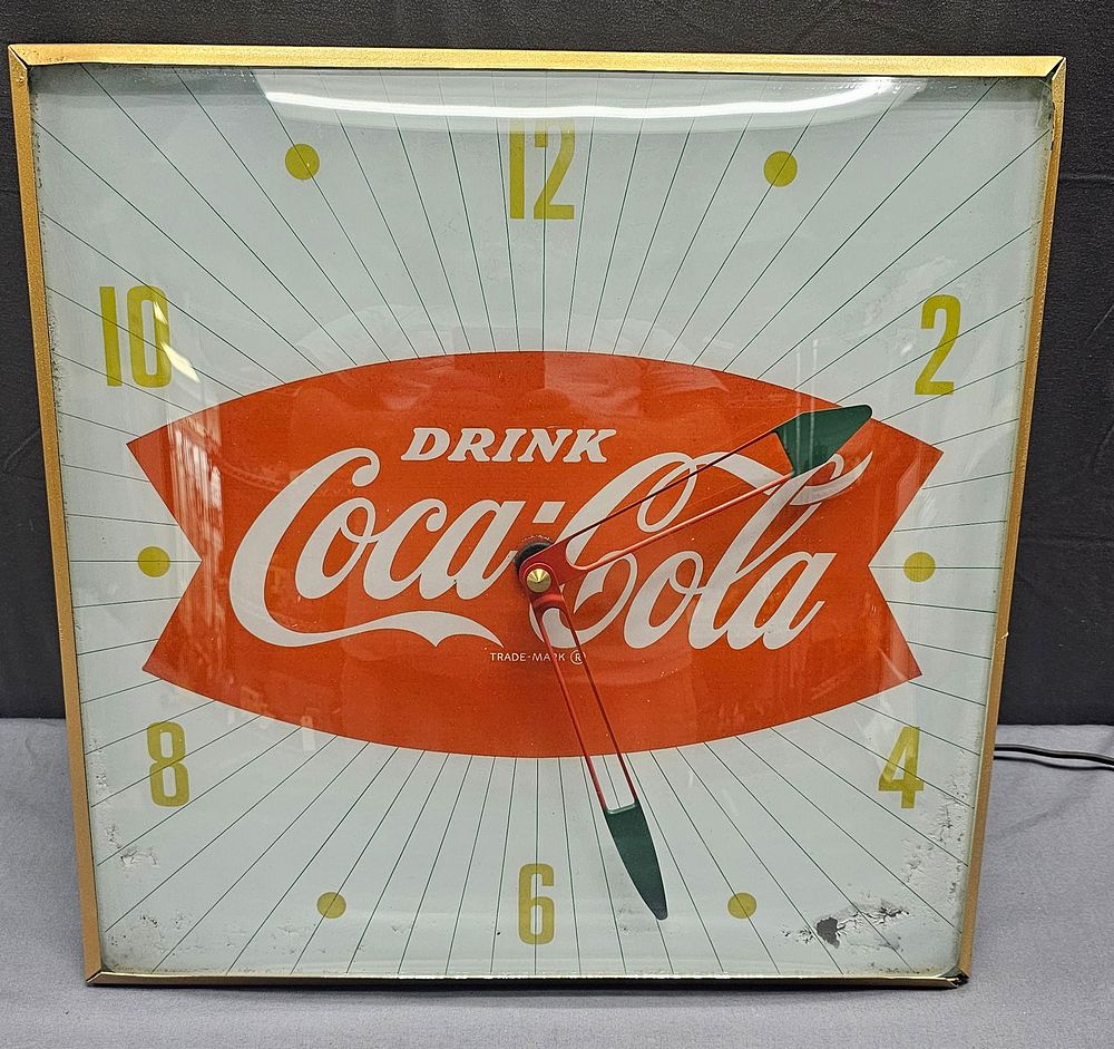 Lot 243A: Coca Cola Fishtail Pam Light Up Clock