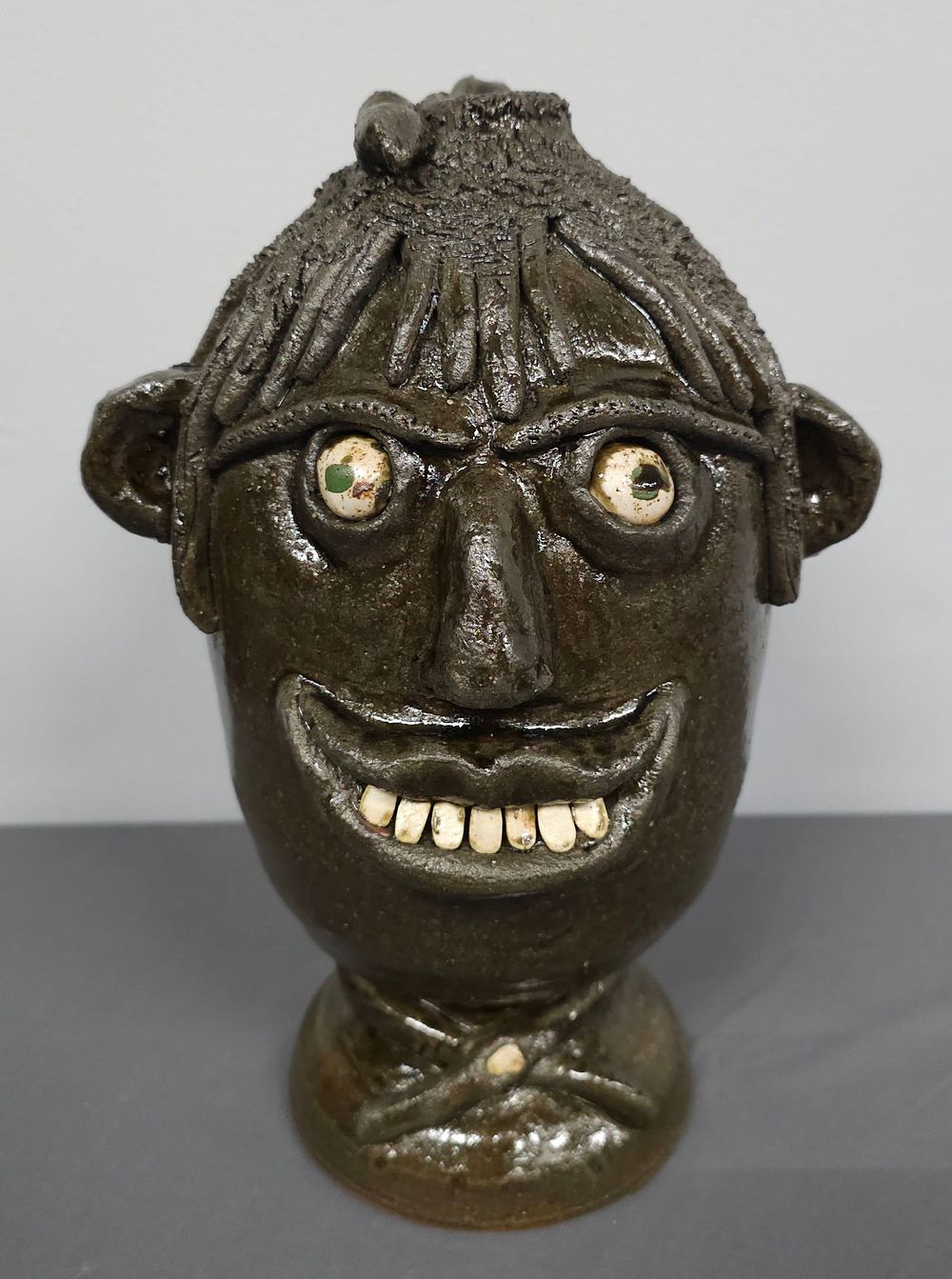 Lot 139: Fine Flossie Meaders Face Jug of  Flossie Meaders