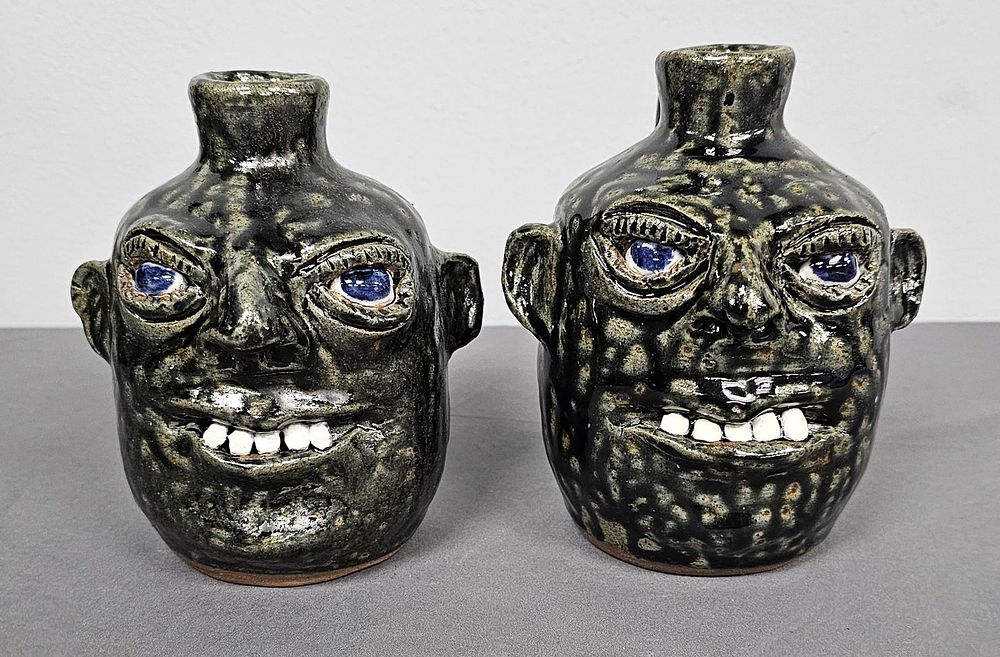 Lot 144: Clete & Billie Meaders "Twins" Face Jug Lot