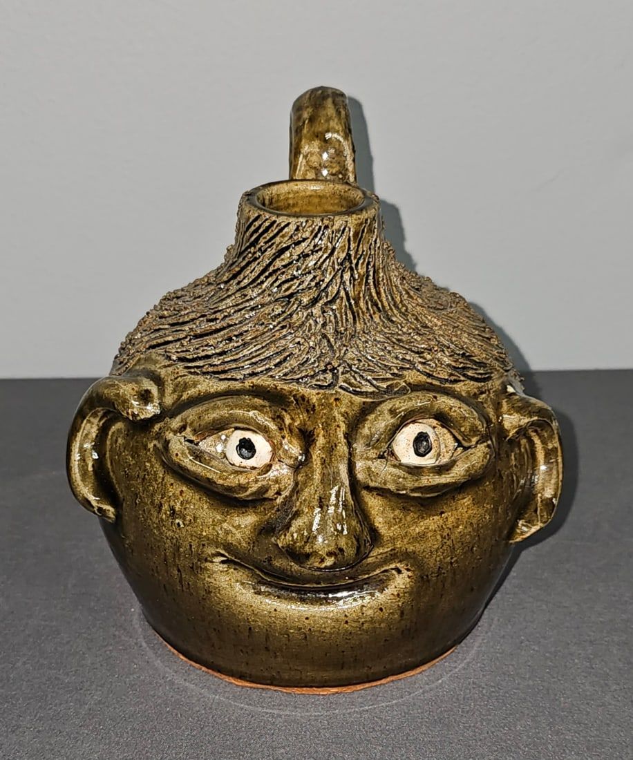Lot 146: 1999 Flossie Meaders Kids Face Jug