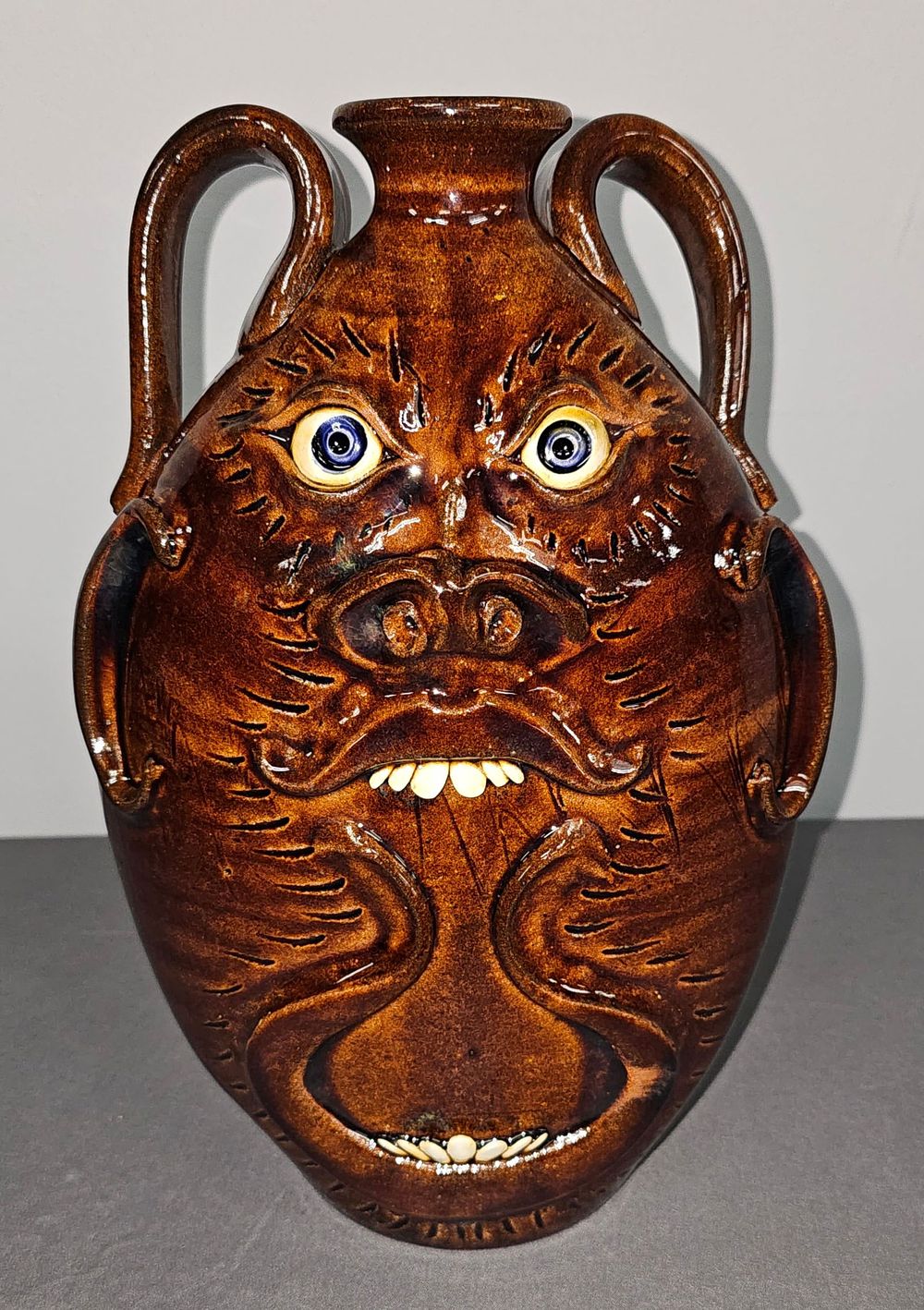 Lot 156: Stunning Roger Corn Face Jug Wall Pocket