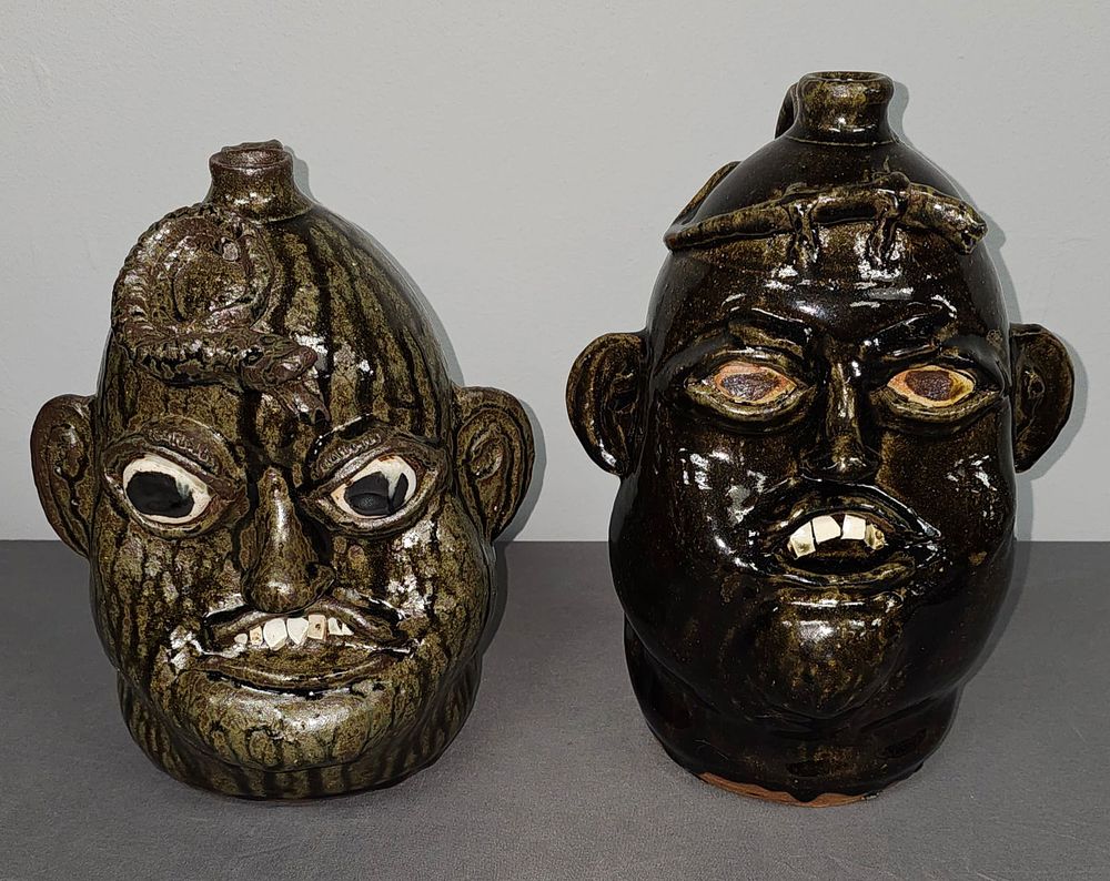 Lot 169: Early Matthew Hewell Face Jug Lot