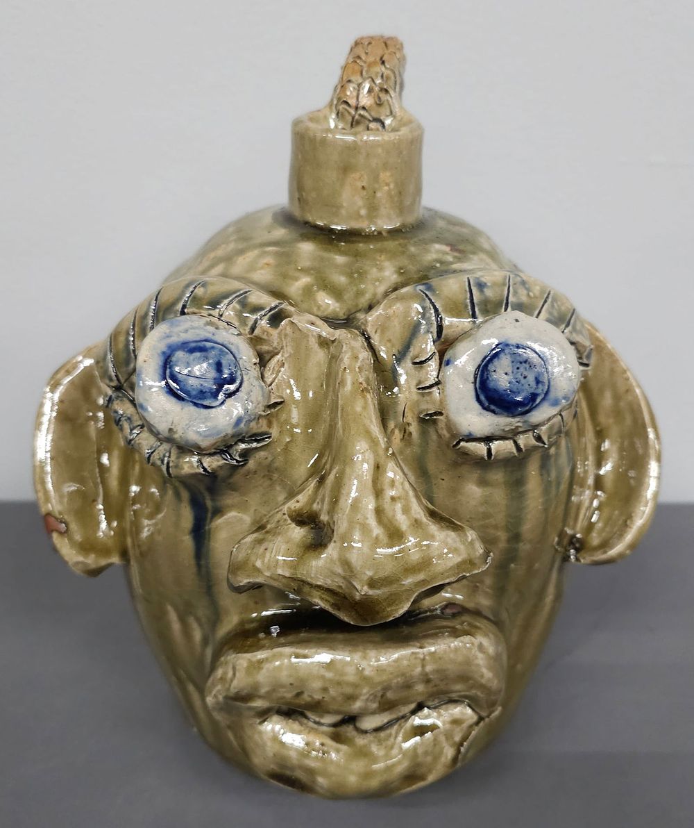 Lot 200: Fine Jerry Brown Face Jug With Snake Handle