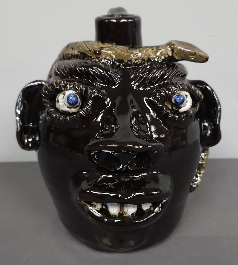 Lot 203: 1993 Jerry Brown Rattlesnake Face Jug