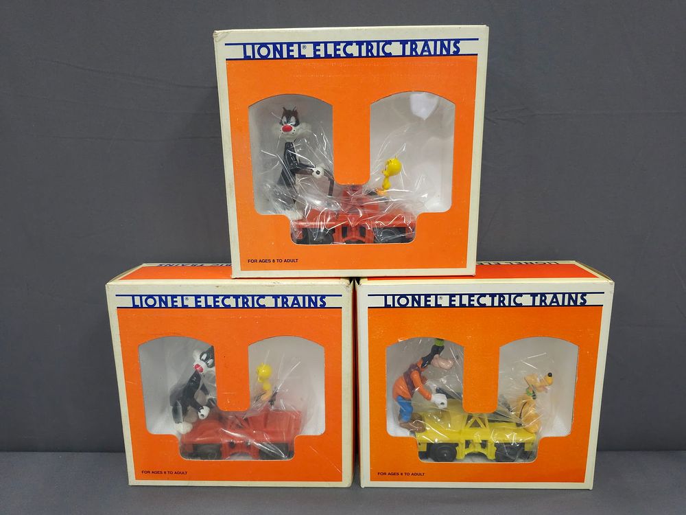 Lot 229: Lionel Hand Car Lot of 3 Cars (New In Box) Modern Era, Lionel Looney Tunes Hand Car Lot of 3 (New In