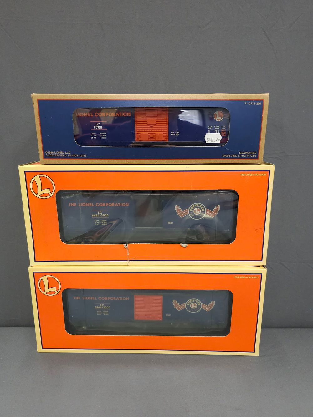 Lot 232: Lionel Box Car Lot 3 Modern Era, Lionel Box Car Lot 3, all are in C-9 condition. 1. Lionel Lines Box