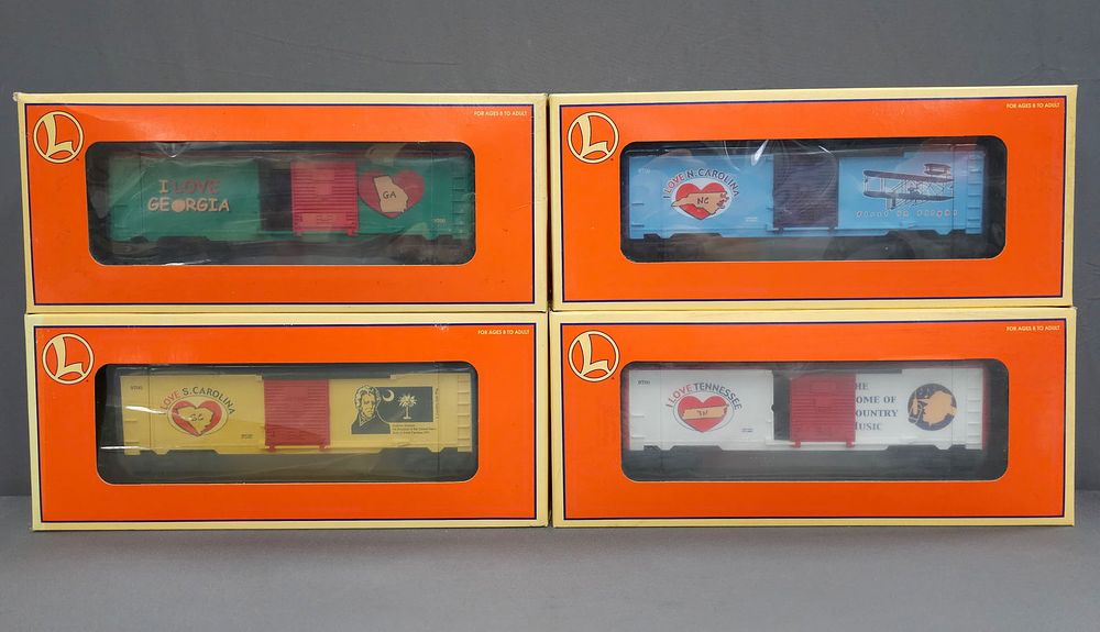 Lot 254: Lionel Commerative Box Car Lot of 4 (NIB) Modern Era, O Gauge. Lionel Commerative Box Car Lot of 4
