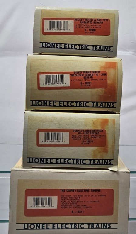 Lot 229: Lionel Disney Electric Engine & Box Car Lot, (NIB)