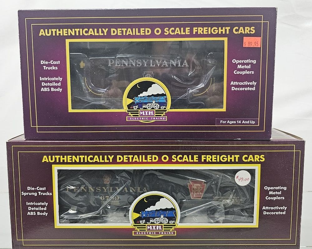 Lot 237: MTH Pennsylvania O-Scale Tank Car & N-6b Caboose