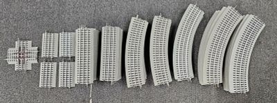 Lionel FasTrack Lot of 51 Like New Pieces as Follows. 1. 1x 90 Degree Crossing. 2. 5" Straight